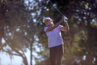 Lexi Thompson follows through with her tee shot on the eighth hole during the first day of the Shriners Children's Open tournament